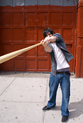 man_with_baseball_bat_swinging